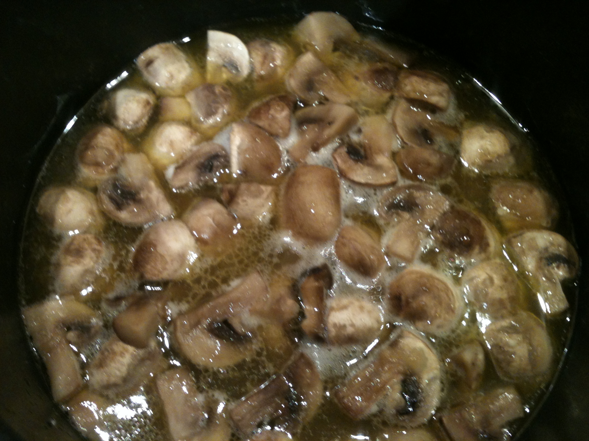 10. In the sauce, add the veal meat, the onions, and the mushrooms.
